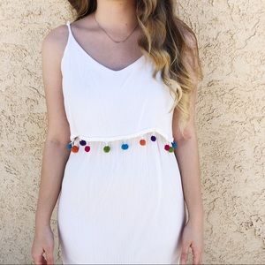 White summer dress with colorful Pom Pom detailing
